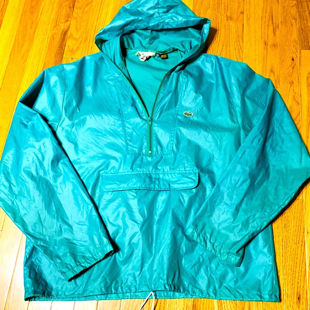 Men’s or Women’s XL Izod Lacoste green pullover.